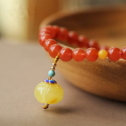 Nanhong cherry red with beeswax pumpkin pendant bracelet7.5mm