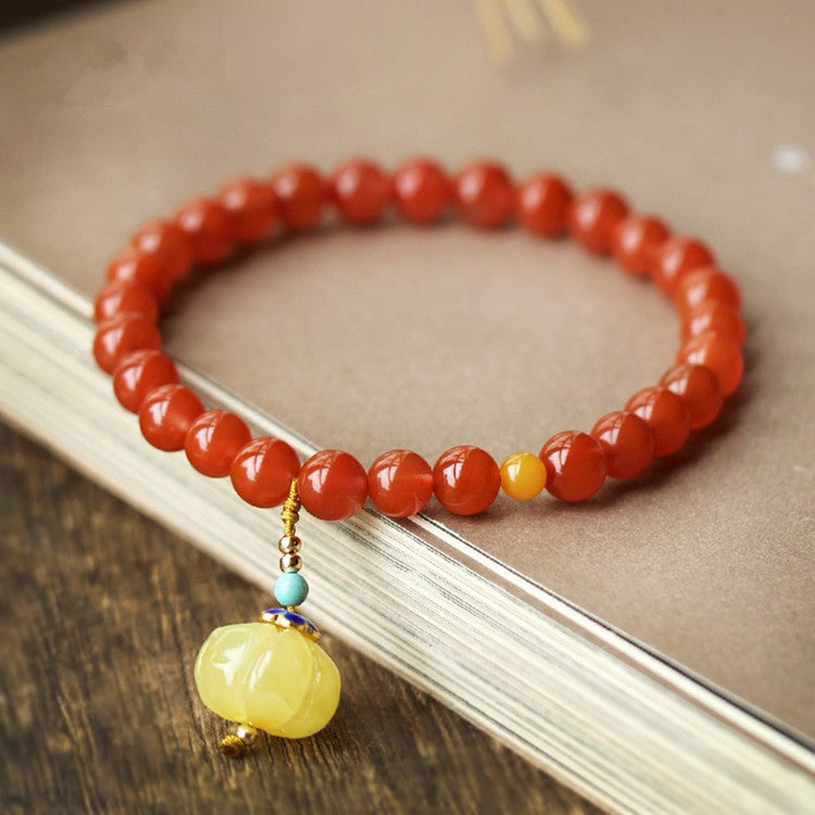 Nanhong cherry red with beeswax pumpkin pendant bracelet7.5mm