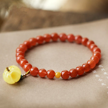 Nanhong cherry red with beeswax pumpkin pendant bracelet7.5mm