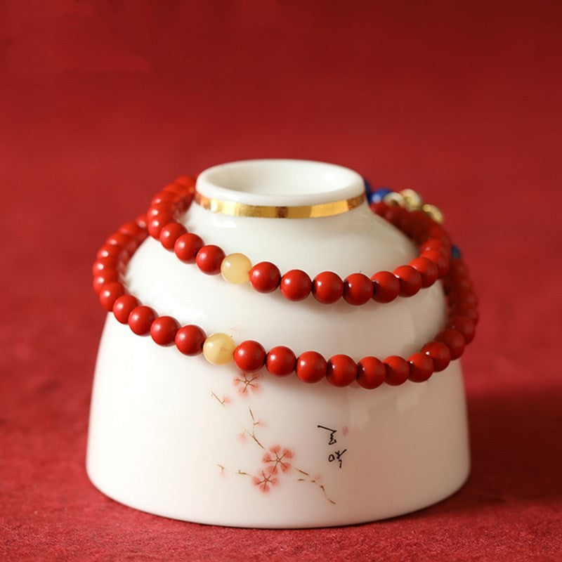 Cinnabar with beeswax lotus bead bracelet 5mm