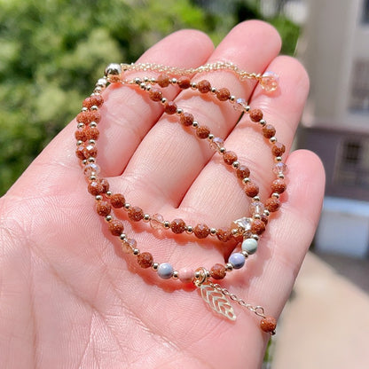 Red gold sandstone and rainbow stone double circle bracelet