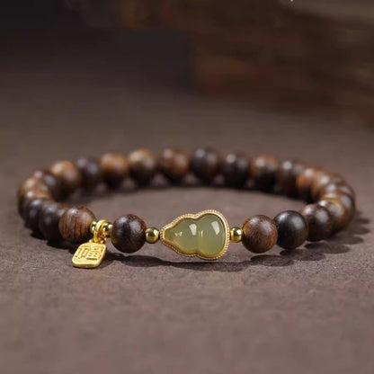 Agarwood bracelet and Hetian jade gourd bracelet