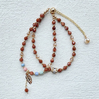 Red gold sandstone and rainbow stone double circle bracelet