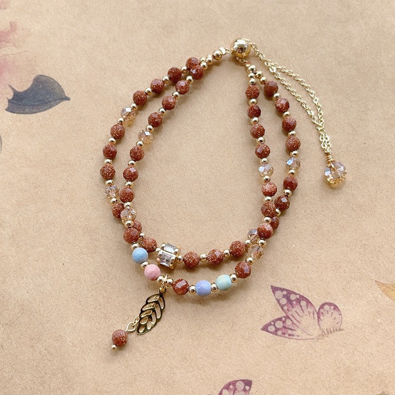 Red gold sandstone and rainbow stone double circle bracelet