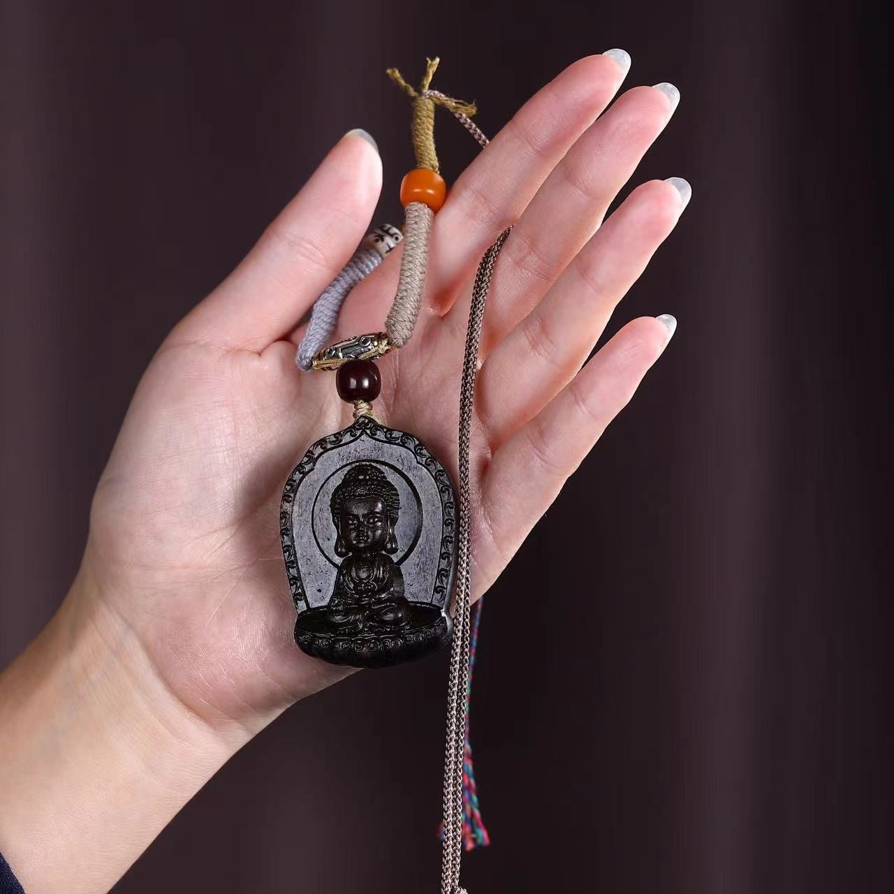 Tibetan hand-woven rope with baby Buddha pendant and amulet lanyard