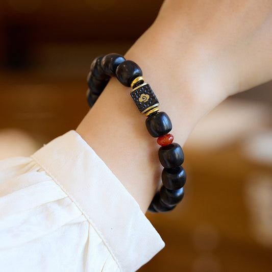 The same purple sandalwood ebony bracelet as the Jiming Temple