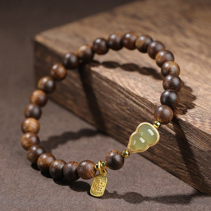 Agarwood bracelet and Hetian jade gourd bracelet