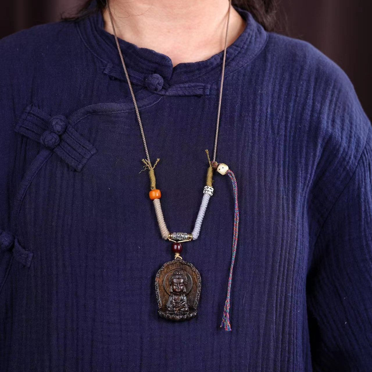 Tibetan hand-woven rope with baby Buddha pendant and amulet lanyard