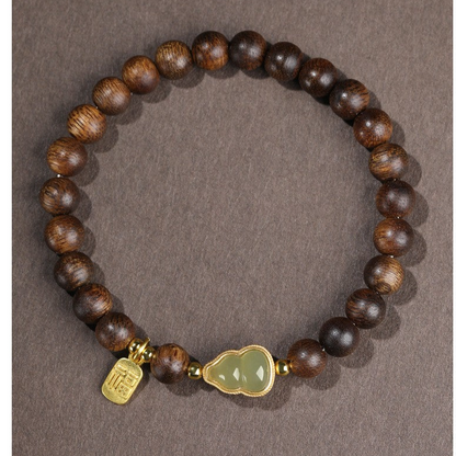 Agarwood bracelet and Hetian jade gourd bracelet