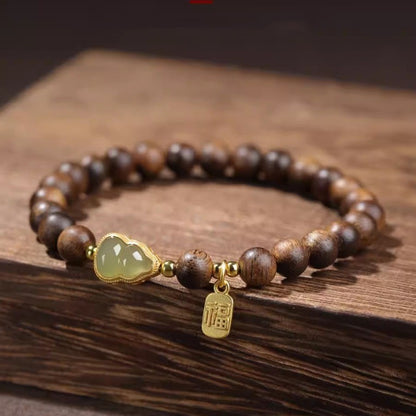 Agarwood bracelet and Hetian jade gourd bracelet