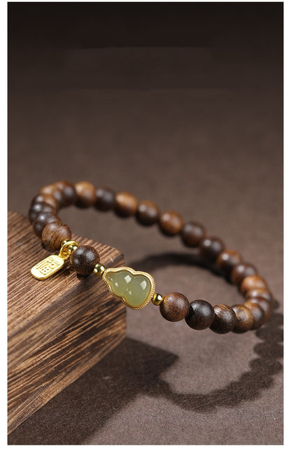 Agarwood bracelet and Hetian jade gourd bracelet