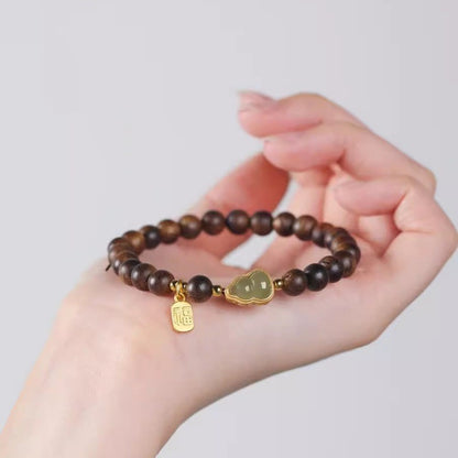 Agarwood bracelet and Hetian jade gourd bracelet